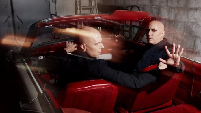 A Perfect Circle 2027 tour featured image A Perfect Circle members Maynard James Keenan and Billy Howerdel in a red convertible, 2026 press photo