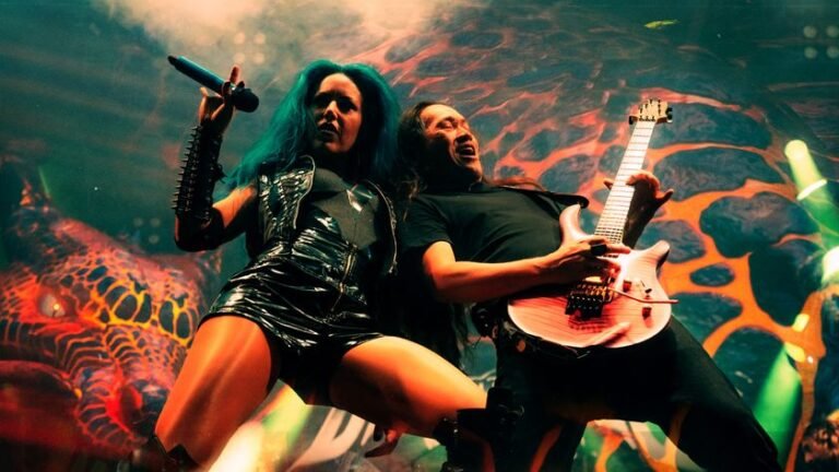 Alissa White-Gluz and Herman Li of DragonForce on stage 2026