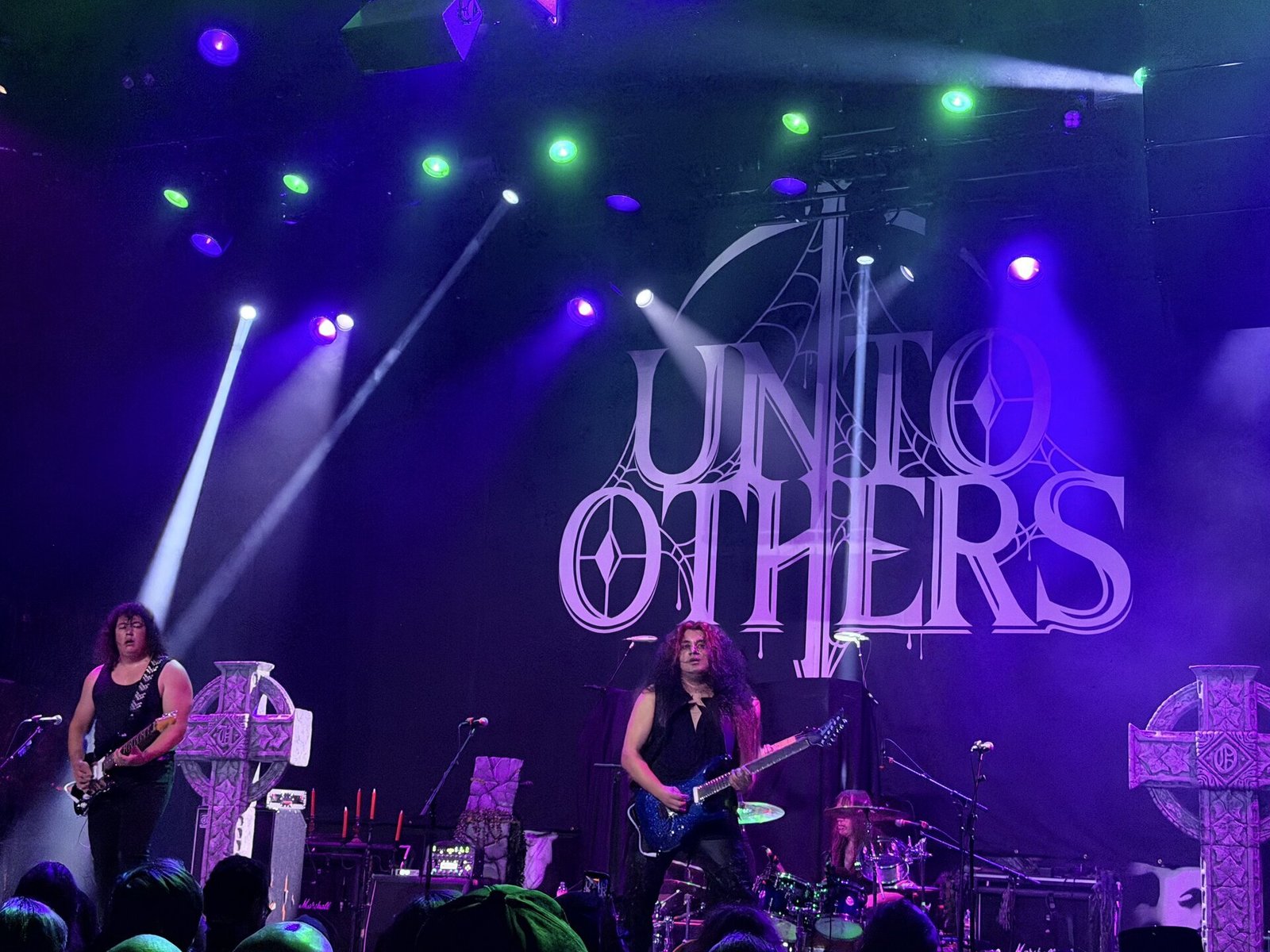 Unto Others under blue and green lights at Belasco Theater, Los Angeles, October 1, 2026